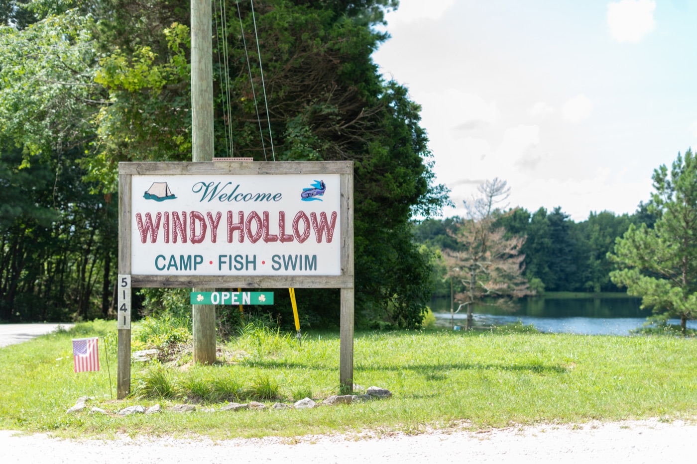 The Windy Hollow welcome sign — Camp, Fish, Swim