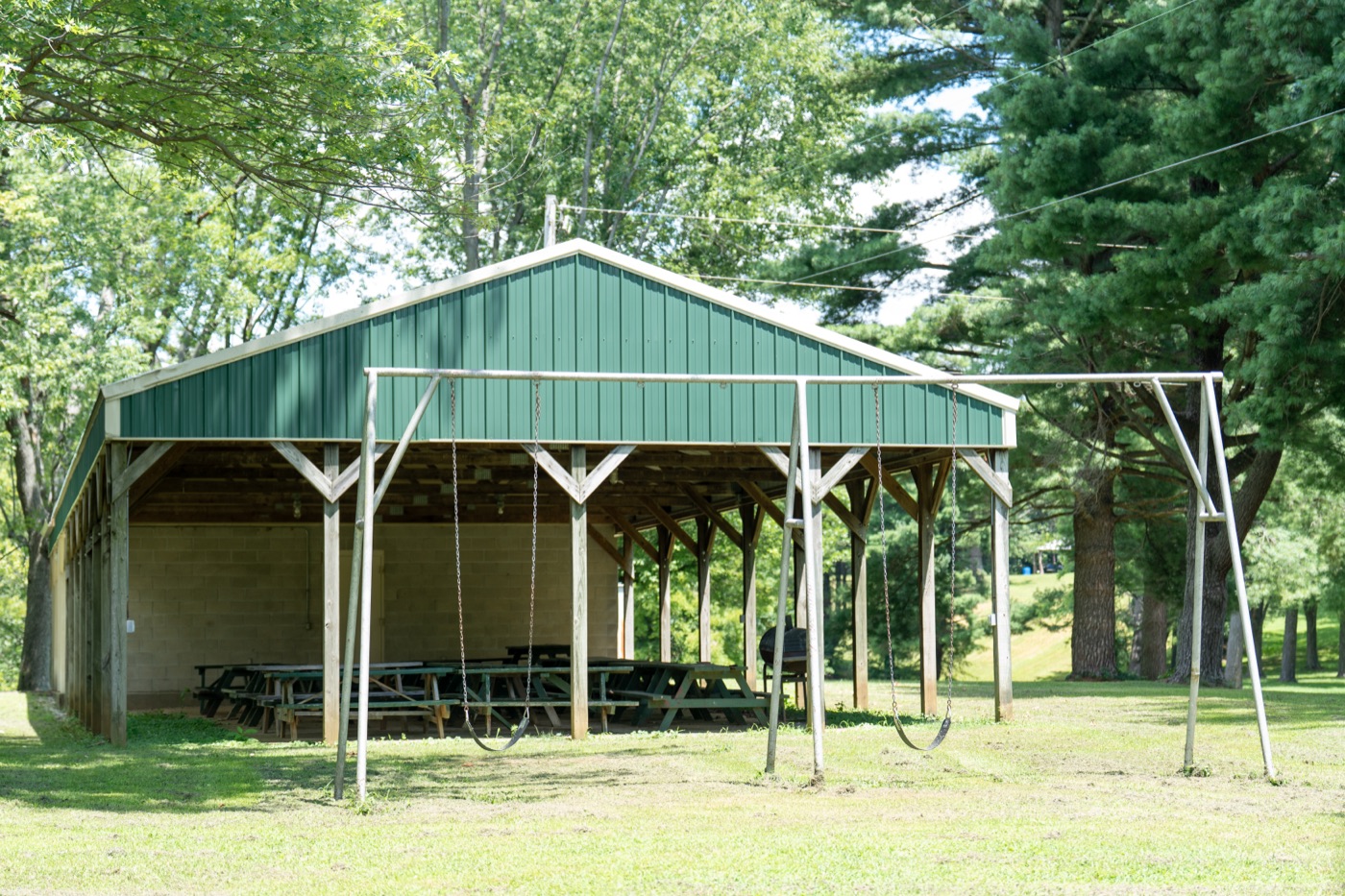 Picnic shelter with swings